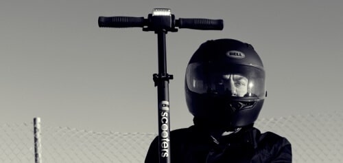 Man wearing an electric scooter helmet