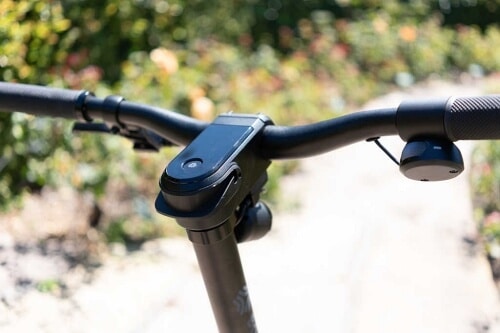 Close up view of electric scooter handlebars and cockpit