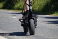 Close up of Minimotors Dualtron 3 scooter with man riding