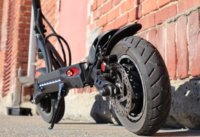 Close up of Kaabo Mantis electric scooter and rear tire
