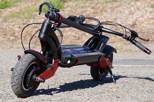 Folded Zero 10X electric scooter in a park