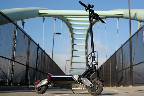 Zero 8X electric scooter on a pedestrian bridge