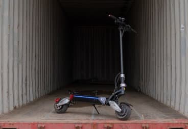8X electric scooter in a shipping container