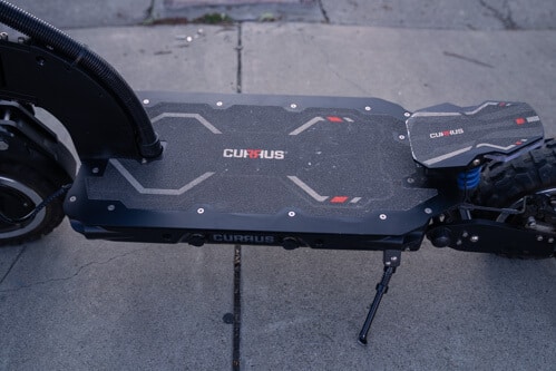 Currus Panther Electric Scooter -front stem, deck, foot rest, kikcstand, cropped view, side view