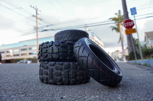 Scooter Racing - stack of scooter tires, different treads, low angle