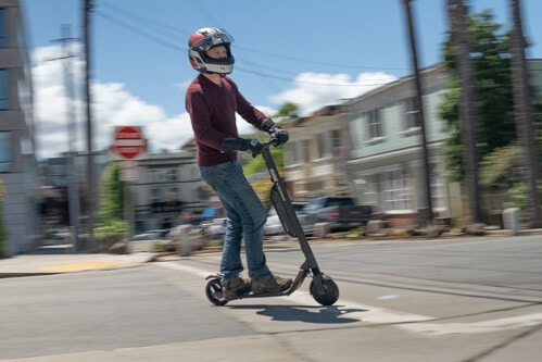 Segway Ninebot ES4 electric scooter - man riding scooter