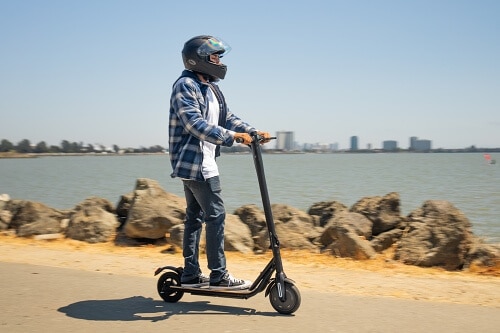 Man riding CityRider electric scooter