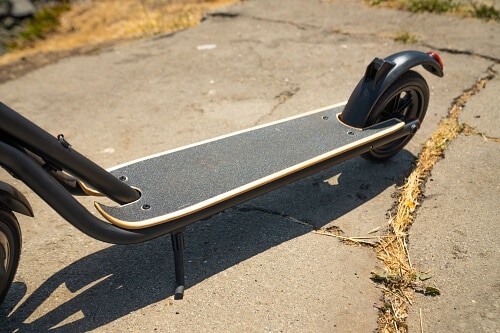Fluid Freeride CityRider skateboard-like deck covered in grip tape