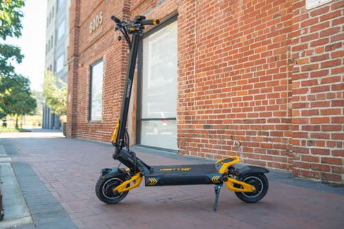 VSett 10+ electric scooter parked in front of a building