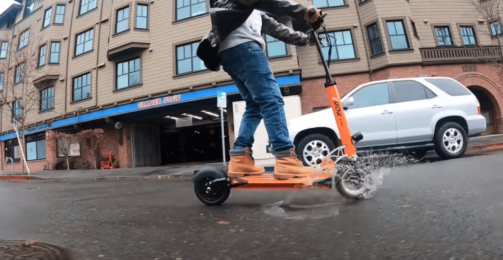 the emove cruiser is one of the best electric scooters for riding in the rain